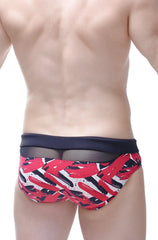 Bikini Ajoupa Chick swim trunks in red black and white abstract brushstroke pattern with navy blue mesh waistband