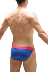 Blue swim trunks with bright pink waistband featuring padding for comfortable beach or pool use