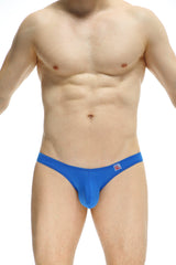 Bright blue form-fitting men’s briefs with small red and white logo on waistband from PetitQ Bikini Dome plum blue collection