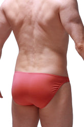 Red bikini dome blush swim trunks with form-fitting smooth stretchy fabric and subtle gradient finish front view