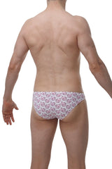 White briefs with a repeating pink cartoon pig face pattern from petitq bikini dome piggy love collection