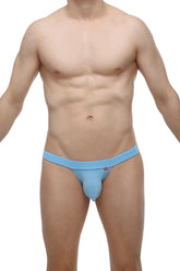 Light blue form-fitting bikini manol briefs made of smooth bamboo fabric with a small logo on the waistband