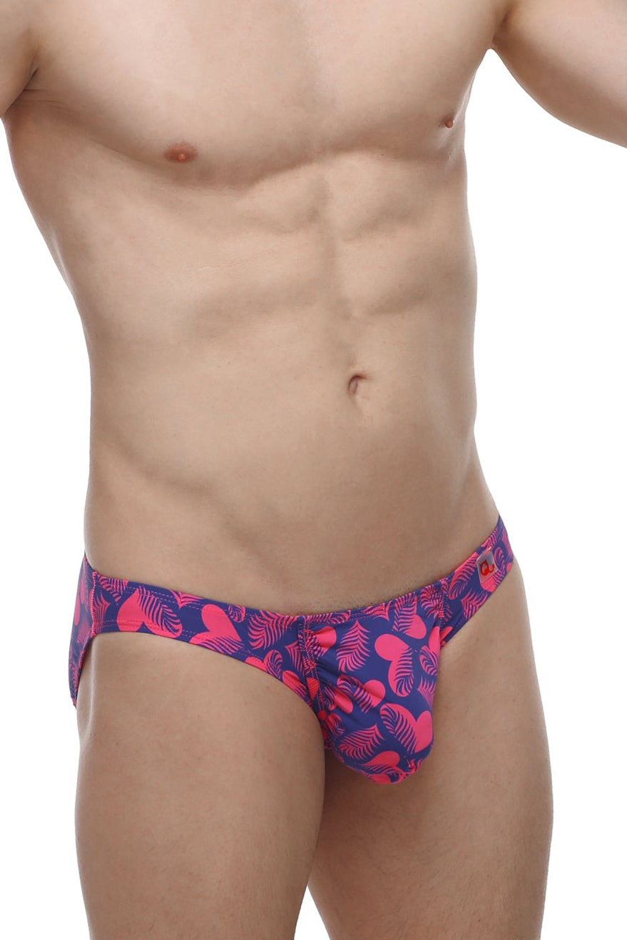 Petitq bikini taik tropical hearts briefs with vibrant pink and navy blue tropical leaf pattern