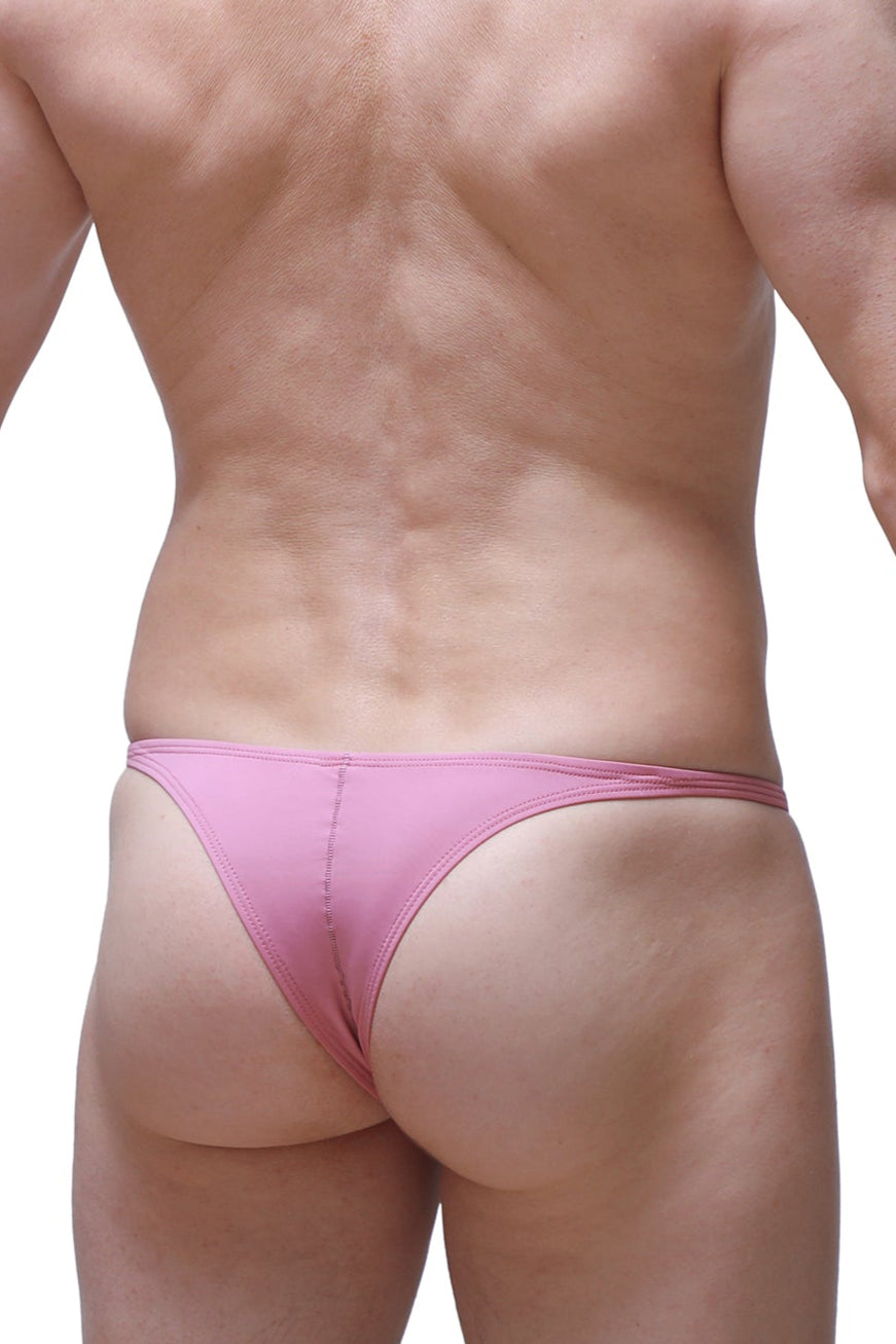 Pink thong made of smooth stretchy fabric with minimal seams in the petitq bikini plellis cameo pink collection