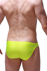 Bright neon yellow bikini taik joe swim trunks made of smooth form-fitting fabric ideal for swimming and beachwear