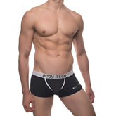 Black men’s boxer briefs with white elastic waistband and trim featuring body tech branding from the body tech maximizer set