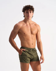 Olive green bolt 3 short with elastic waistband and side pockets designed for athletic use