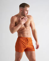 Orange bolt 3 shorts with drawstring waistband designed for athletic performance and comfort