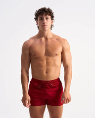 Bolt 3 inch short red velvet swim trunks with a drawstring waistband for adjustable fit and comfortable wear