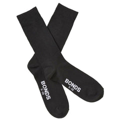 Black cotton bonds everyday oxford crew socks size 6-10 showing white branding on heel back side view