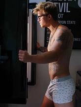 White boxer briefs with gray waistband featuring dear logo and dark patterned dots in size l for men
