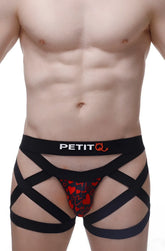 Black strappy men’s boxer brief with red heart pattern and petitq logo on waistband king of hearts design