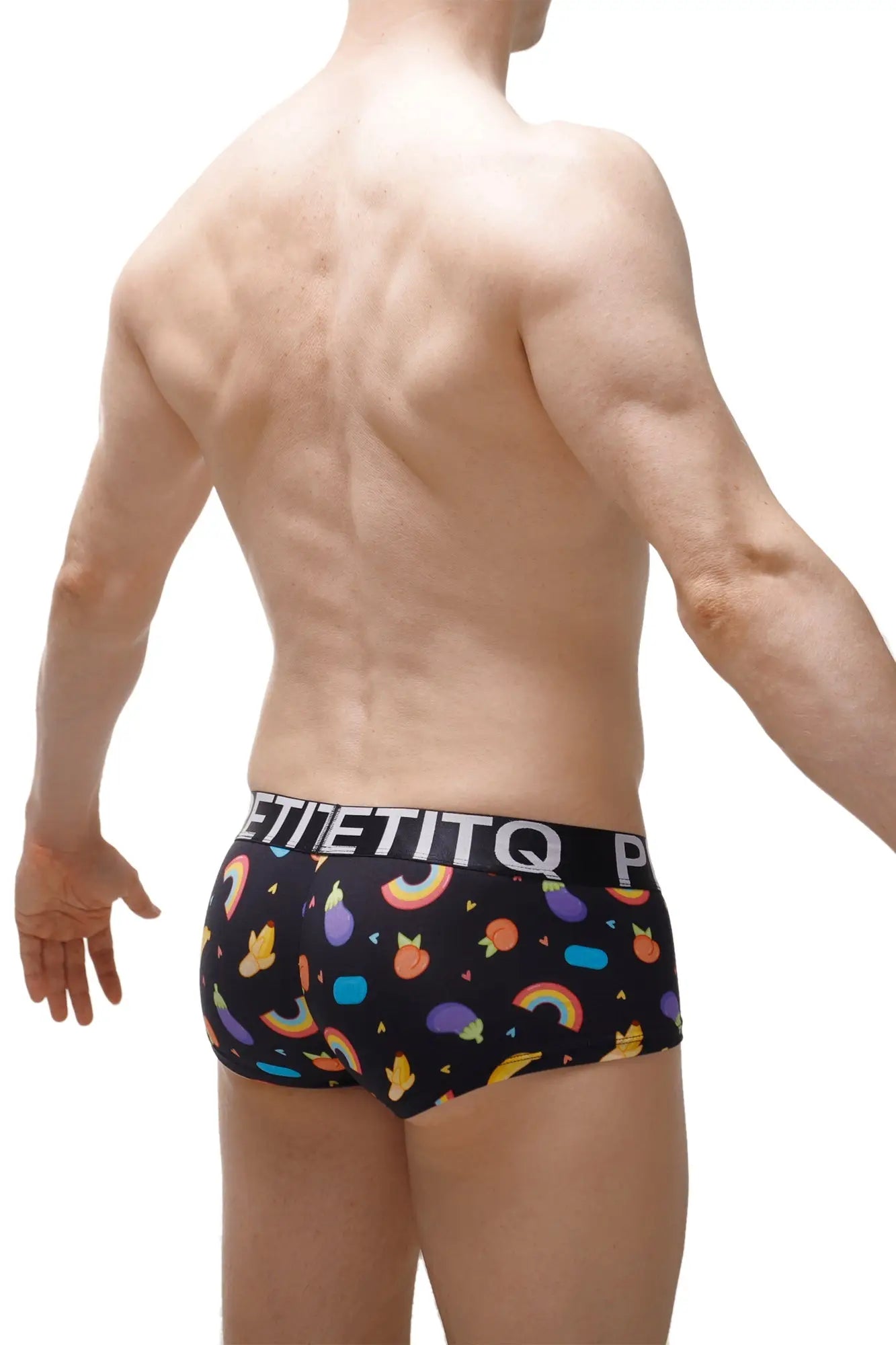 Boxer brief Taik Sitges featuring black fabric with vibrant rainbows fruits and geometric shapes in yellow purple blue and orange