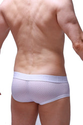 White mesh boxer briefs with solid white waistband featuring subtle qube branding from the chill bee white line