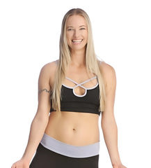 Bra top black sports bra with white crisscross straps and matching light gray waistband shown from back