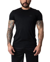 Black short-sleeved crew neck brandmark tee with small logo on left chest made from soft breathable fabric