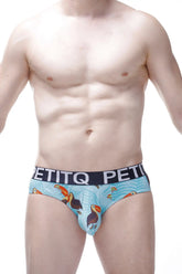Light blue men’s briefs with a playful toucan pattern and black petitq branded elastic waistband Brief Chill Toucan