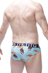 Light blue men’s briefs with playful toucan pattern and black petitetiq branded waistband brief chill toucan