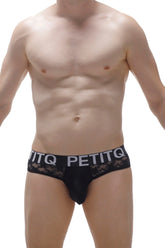 Black lace-trimmed men’s briefs in black with petitq branding on the waistband from brief jans lace collection
