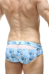 Blue and white wave-patterned swim trunks with a white waistband from petitq swim bikini ajoupa tartane collection