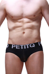 Black petitq brief vic with sheer front panel and white lettering on the waistband for men