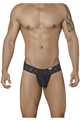 Black lace thong CandyMan 99315 with intricate floral patterns and a small brand tag on the waistband in black