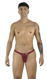 Model posing in CandyMan burgundy mesh thongs, featuring a minimal, slim-fit design with a small brand logo tag.
