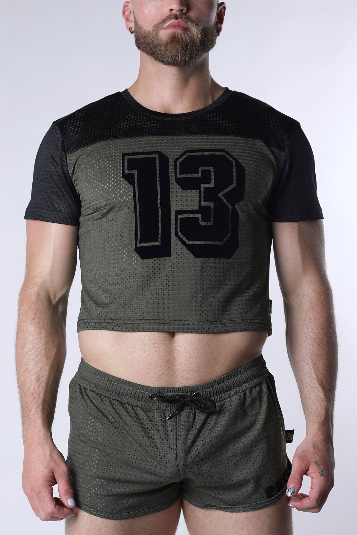 Starter mesh crop top in olive green with black short sleeves and a bold 13 graphic on the chest