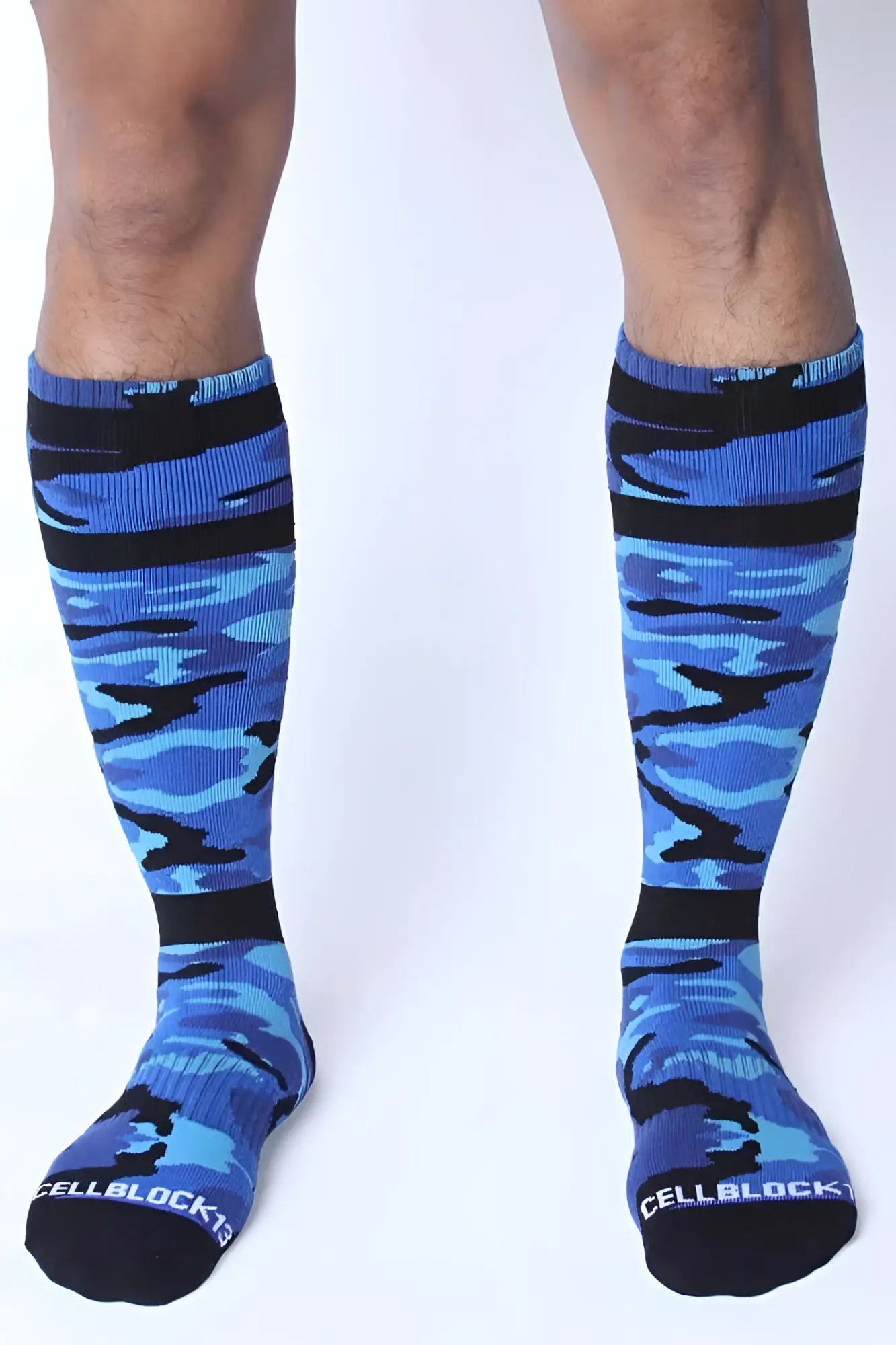 Blue and black camouflage knee-high CellBlock 13 Foxhole socks with CellBlock branding on the toe in one size