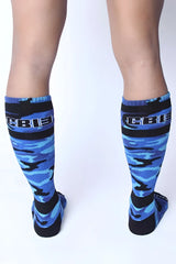 Blue and black camouflage knee-high socks with cbi branding on cuff from cellblock 13 foxhole socks size one size