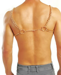 Gold-colored chain harness with two large circular rings and central link worn across the back side