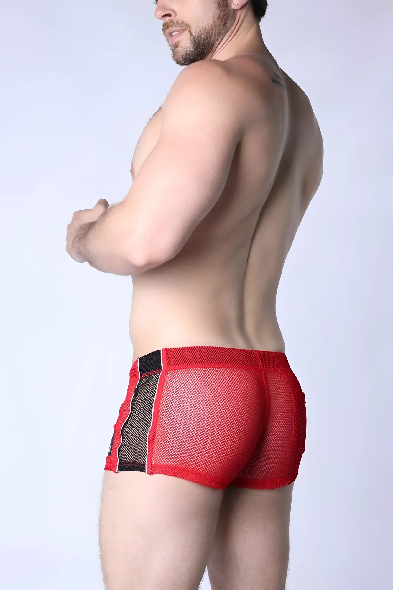 Chain reaction mesh short red mesh briefs with black side panels showcasing breathable fabric and sporty design