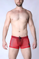 Red mesh swim trunks with black drawstring waistband called Chain Reaction Mesh Short designed for comfort and style