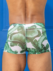 Little Boy Blue Design Chris Square Cut mesh swim trunks in green tropical banana leaf pattern on white background