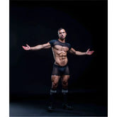 Black mesh athletic top with short sleeves and matching circuit mesh jockshorts designed for performance wear