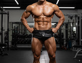 Black shiny leather gym shorts metroMalewear classic bodybuilding trunk leather 6 inch front view