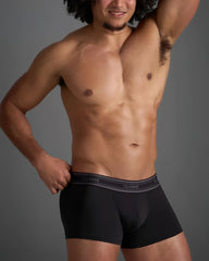 Black classic cotton trunk boxer briefs with gray elastic waistband featuring white brand name lettering