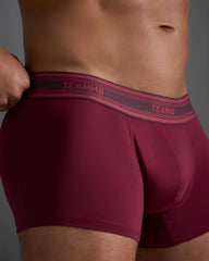 Maroon classic cotton trunk boxer briefs with pink and dark gray elastic waistband featuring brand name