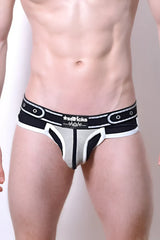 Black and white mesh briefs with a bold modern design and asssticks logo on the waistband comicaze brief
