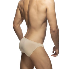 Beige cotton bikini brief with a smooth seamless design and form-fitting fit for comfortable everyday wear