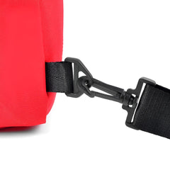 Red canvas crossbody sling bag with black webbing strap and plastic buckle shoulder bag design