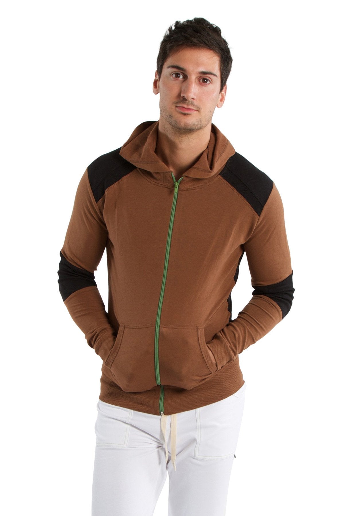 Form-fit crossover yoga track performance hoodie in chocolate with black featuring a green zipper pull and zip-up front
