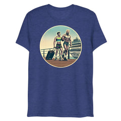 Blue heathered t-shirt with a circular graphic of two muscular men with luggage on a dock in front of a cruise ship