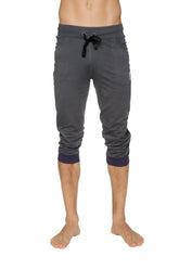 Dark gray heathered cuffed yoga pants with navy ribbed cuffs and black drawstring waistband in charcoal w eggplant