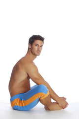 A man wearing cuffed yoga pants in ice blue with orange stripes designed for comfortable activewear use