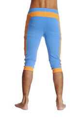 Cuffed yoga pants in ice blue with orange featuring ribbed waistband and cuffs in capri-length athletic style