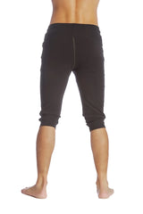 Black cuffed yoga pants with snug fit and elastic waistband designed for comfort and flexibility during workouts