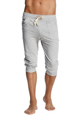 Gray heathered cuffed yoga pants with side pockets and drawstring waistband for comfortable activewear
