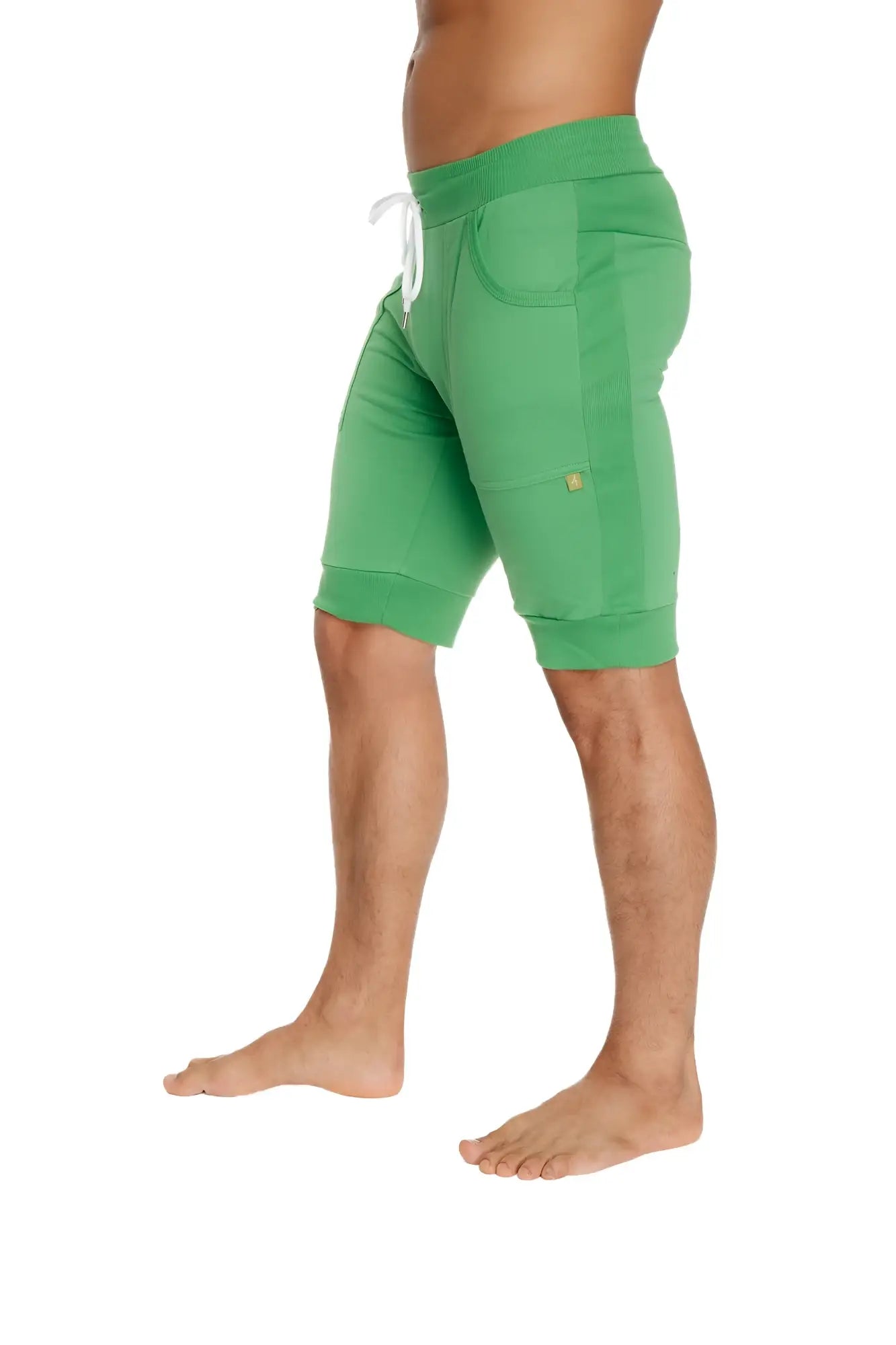 Cuffed yoga short in bamboo green with white drawstring and side pockets made from soft breathable fabric