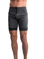 Dark gray cuffed yoga shorts with drawstring waistband and black elastic cuffs for athletic wear